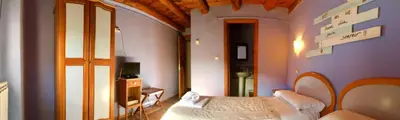 Cama o camas de una habitación en Casa Rural Araceli