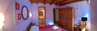 Una televisión o centro de entretenimiento en Casa Rural Araceli