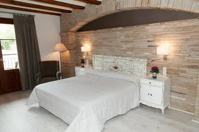 Cama o camas de una habitación en Hotel Villa de Alquézar