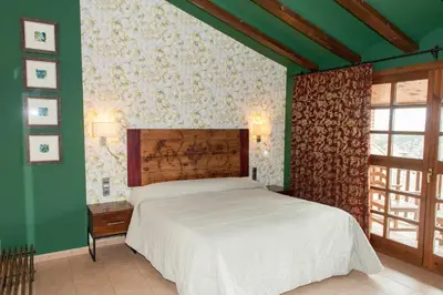Cama o camas de una habitación en Hotel Villa de Alquézar