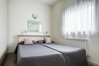 Cama o camas de una habitación en Residencia Universitaria Resa Los Abedules