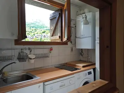Una cocina o zona de cocina en Apartamentos 3000 Escarrilla