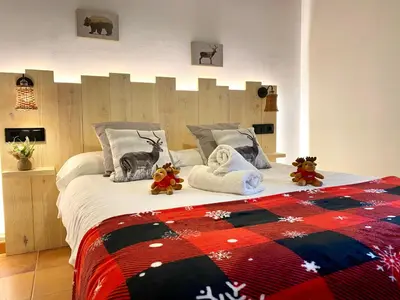 Cama o camas de una habitación en Apartaments Alta Muntanya