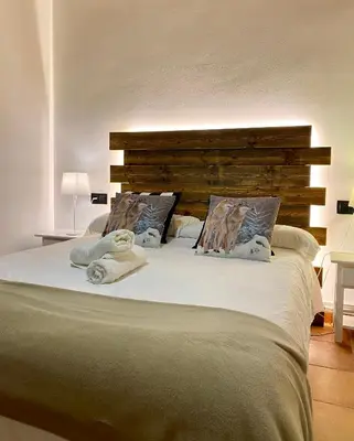 Cama o camas de una habitación en Apartaments Alta Muntanya