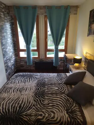 Cama o camas de una habitación en Apartamento de montaña 