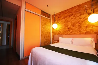 Cama o camas de una habitación en Hotel Posada Guadalupe