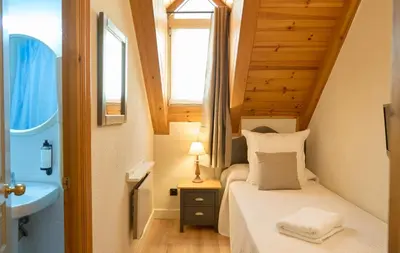 Cama o camas de una habitación en Hotel Anglada