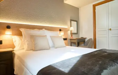 Cama o camas de una habitación en Hotel Anglada