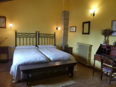 Cama o camas de una habitación en Casa Rural Boletas