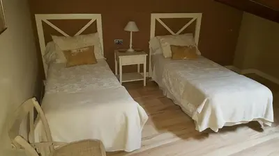 Cama o camas de una habitación en El Encanto del Moncayo