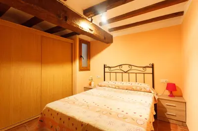 Cama o camas de una habitación en Apartamentos La Pastora