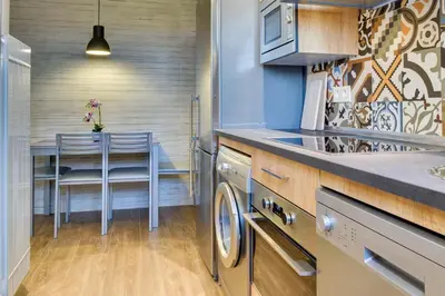 Una cocina o zona de cocina en Apartamentos San Lázaro