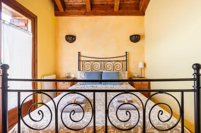 Cama o camas de una habitación en La Voz del Silencio