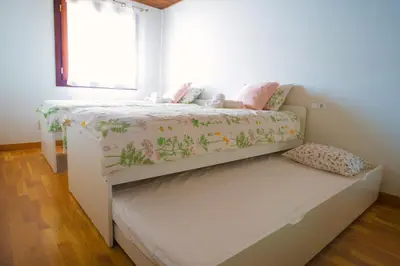 Cama o camas de una habitación en Ca' la Júlia Vall de Boi
