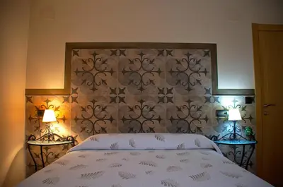 Cama o camas de una habitación en casa oliva la bodegueta