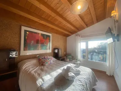 Cama o camas de una habitación en Agrovillaujue apartamentos rurales
