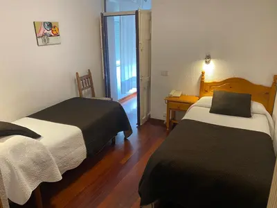 Cama o camas de una habitación en Hotel La Rambla