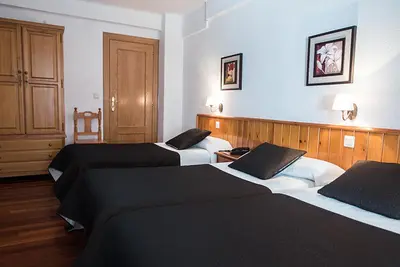 Cama o camas de una habitación en Hotel La Rambla