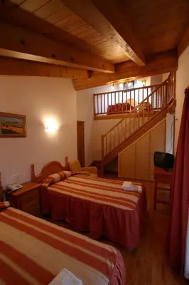 Cama o camas de una habitación en Hotel Can Mestre
