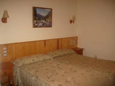 Cama o camas de una habitación en Hostal Pernalle