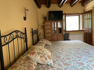 Cama o camas de una habitación en Casa Rural Era de Ferro