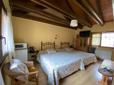 Cama o camas de una habitación en Casa Rural Era de Ferro