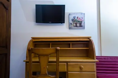 Una televisión o centro de entretenimiento en Casa Rural Marín