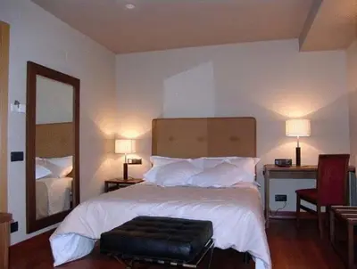 Cama o camas de una habitación en Hotel Restaurante Revestido