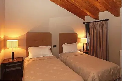 Cama o camas de una habitación en Hotel Restaurante Revestido