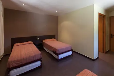 Cama o camas de una habitación en Alberg Les Estades
