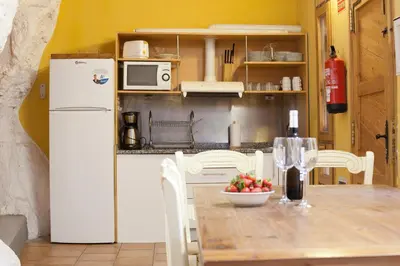 Una cocina o zona de cocina en Cuevas de las Bardenas