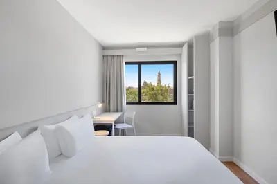 Cama o camas de una habitación en B&B HOTEL Zaragoza Centro