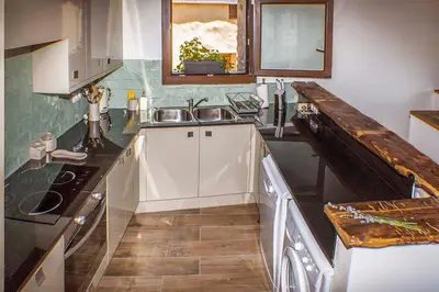Una cocina o zona de cocina en Cal Pastisser de Taús