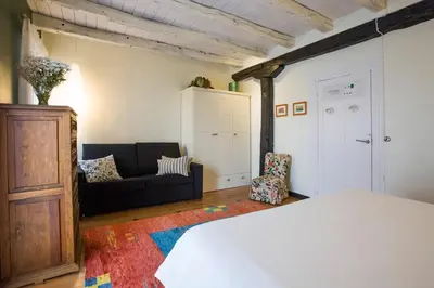 Cama o camas de una habitación en Mendiburu Rural Boutique