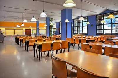 Un restaurante o sitio para comer en Albergue Era Garona