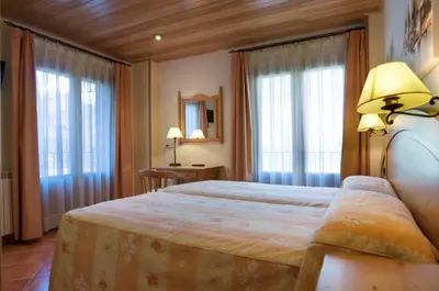 Cama o camas de una habitación en Hostal Pey