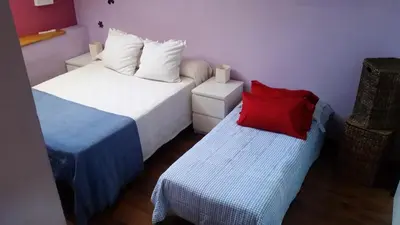 Cama o camas de una habitación en El Desván de San Antón