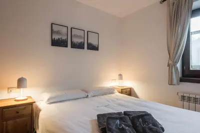 Cama o camas de una habitación en Prat deth Pas by SeaMount Rentals