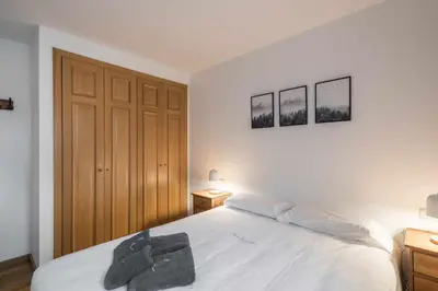 Cama o camas de una habitación en Prat deth Pas by SeaMount Rentals