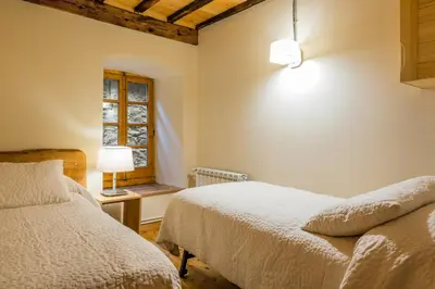Cama o camas de una habitación en Casa Rural 