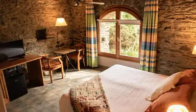 Cama o camas de una habitación en Mas D'en Roqueta