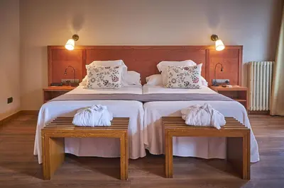Cama o camas de una habitación en Hotel-Hostal Sport