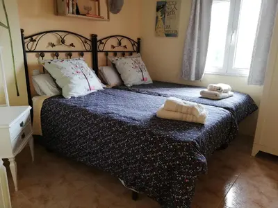 Cama o camas de una habitación en Casa de la abuela Bego