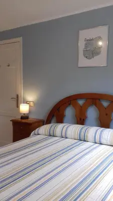 Cama o camas de una habitación en Vivienda Lanzón