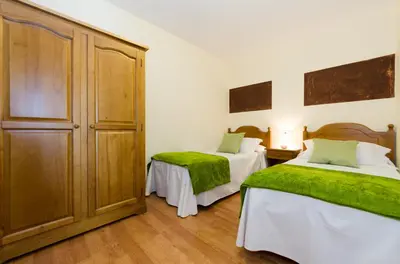 Cama o camas de una habitación en Hotel Apolo
