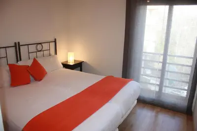 Cama o camas de una habitación en Apartamento Ainsa Pirineo