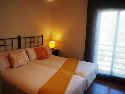 Cama o camas de una habitación en Apartamento Ainsa Pirineo