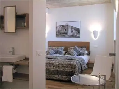 Cama o camas de una habitación en Hotel Roncesvalles