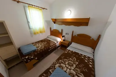 Cama o camas de una habitación en Bungalowpark Isábena