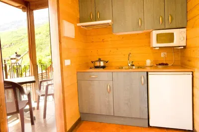 Una cocina o zona de cocina en Bungalows La Borda d´Arnaldet